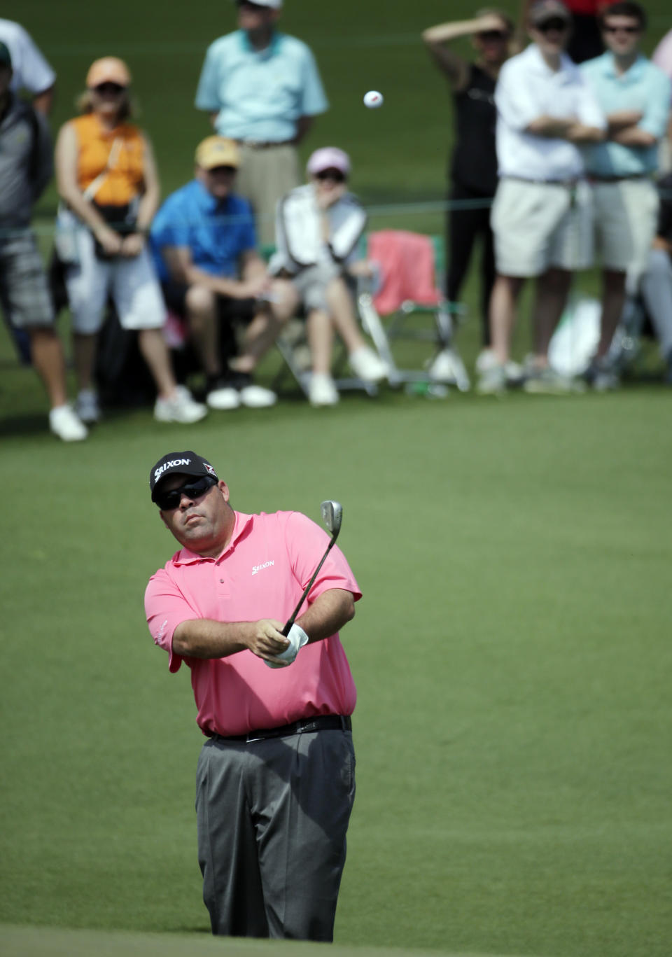 Kevin Stadler chips to the second green during the second round of the Masters golf tournament Friday, April 11, 2014, in Augusta, Ga. (AP Photo/Chris Carlson)