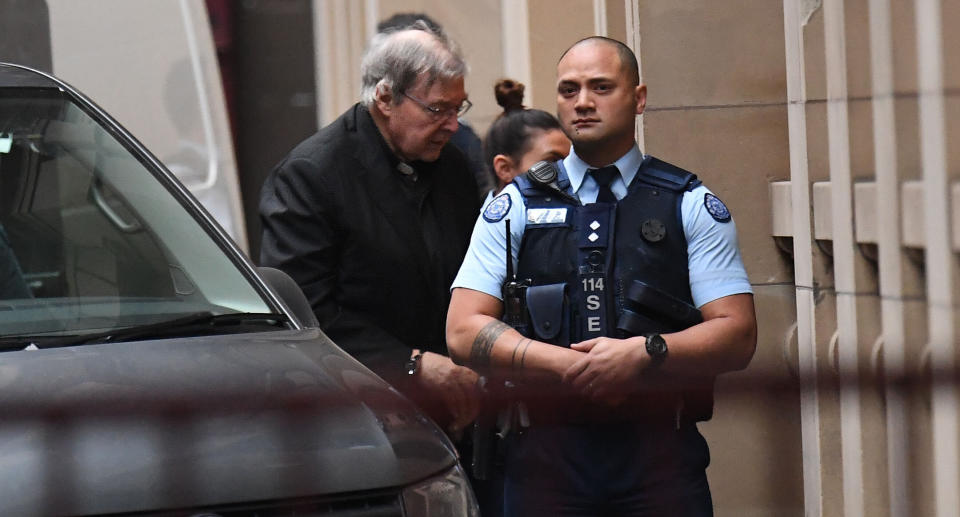 The Catholic cardinal, who is pictured here in handcuffs, is appealing his conviction for sexually abusing two boys.