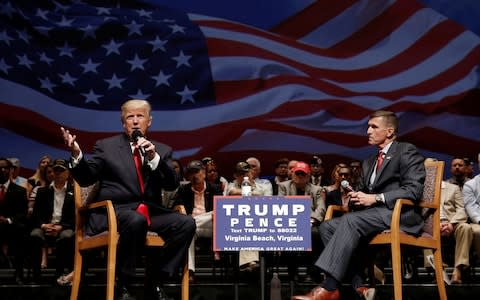 Donald Trump, left, and Michael Flynn during a presidential campaign event in September 2016 - Credit: REUTERS/Mike Sega