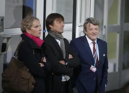 (L-R) French Socialist party deputy and former Eocology minister Delphine Batho, French environmental activist and special envoy for the protection of the planet Nicolas Hulot and French politician and former Ecology minister Jean Louis Borloo wait for the arrival of head of states and government during the opening day of the World Climate Change Conference 2015 (COP21) at Le Bourget, near Paris, France, November 30, 2015. REUTERS/Christian Hartmann