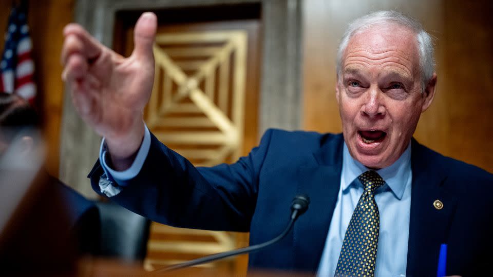 Sen. Ron Johnson, a Republican from Wisconsin, flipped through page after page of records produced by the Coast Guard that were almost entirely redacted. (Photo by Andrew Harnik/Getty Images - Andrew Harnik/Getty Images