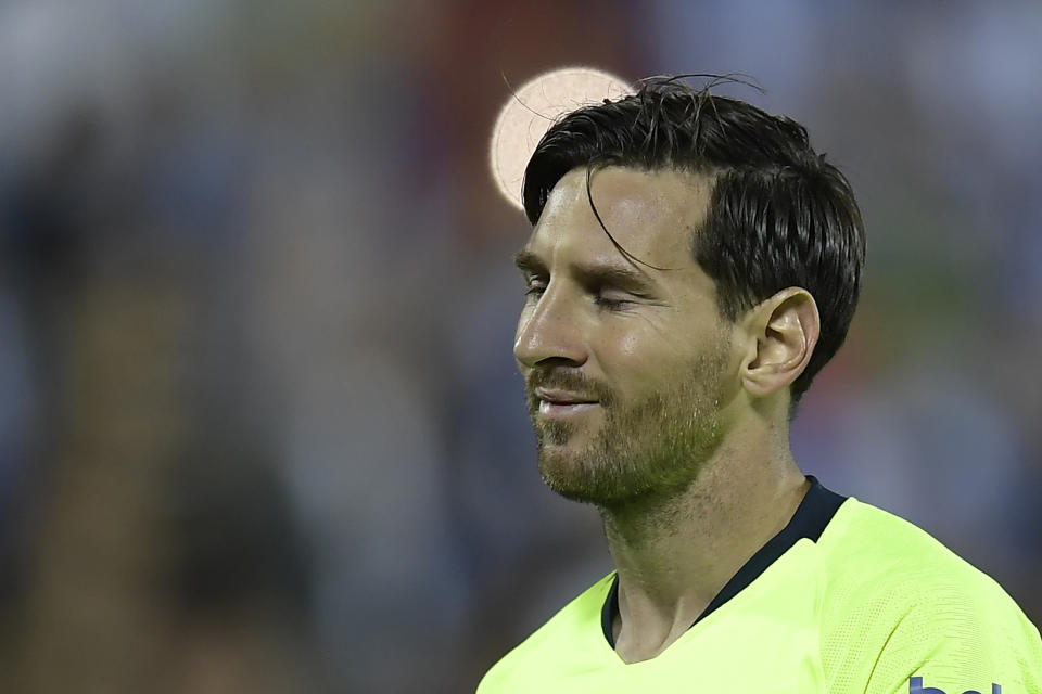 Barcelona’s Lionel Messi grimaces during Wednesday’s loss to Leganes. Barca and rival Real Madrid lost on the same day for the first time since early 2015.