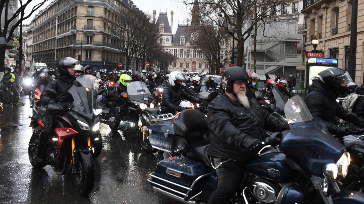 French bikers demonstrate against the implementation of pay parking for powered two-wheel vehicles in Paris, on February 6, 2021. (Photo by Alain JOCARD / AFP)