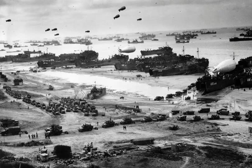 World War II photograph shows an aerial view of the various naval vessels around the beaches of Normandy in northernmost France. Shown here landing supplies such as tanks, military vehicles, weapons and troops; the Invasion of Normandy is considered the largest amphibious invasion in history