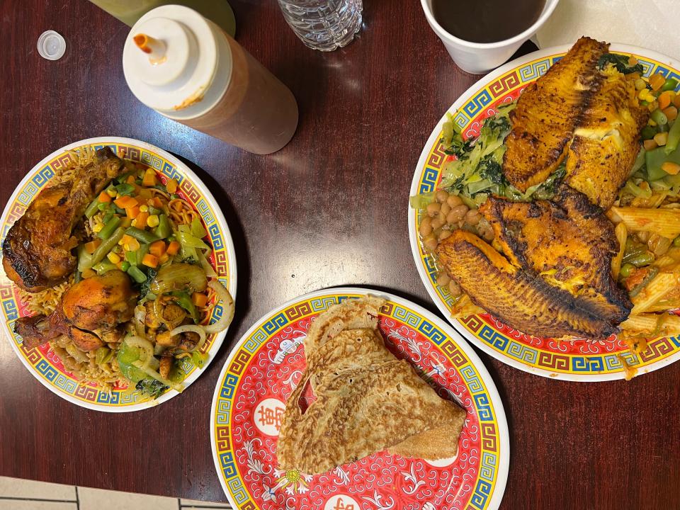 plates of food from mogadishu restaurant on a table