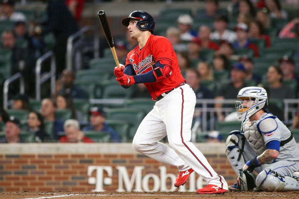 Atlanta Braves third baseman Austin Riley hits a home run against the New York Mets in the second inning of Friday's game.