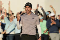 Nick Taylor, of Canada, celebrates after a regulation-tying birdie putt on the 18th hole, forcing a playoff with Charley Hoffman, during the final round of the Phoenix Open golf tournament Sunday, Feb. 11, 2024, in Scottsdale, Ariz. Taylor defeated Hoffman on the second playoff hole to win the tournament. (AP Photo/Ross D. Franklin)