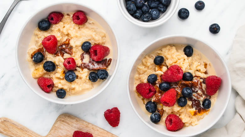 Overview of baked rice pudding served with fresh berries