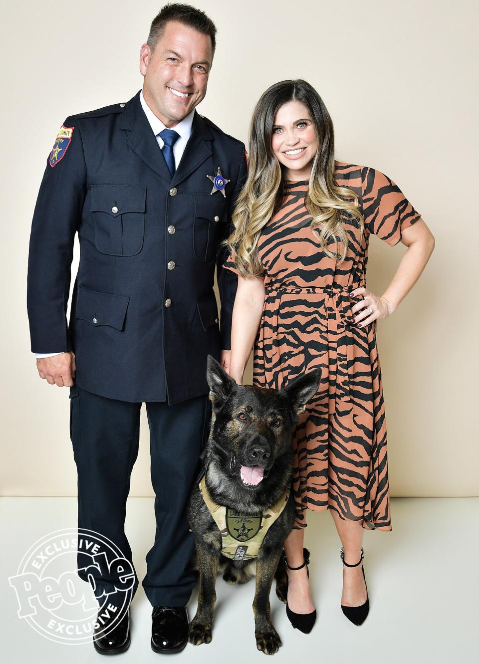 John Forlenza and Danielle Fishel with K-9 Dax 