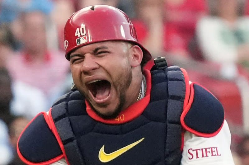 St. Louis Cardinals catcher Willson Contreras yells in pain, grabbing his left arm after being hit by a bat by New York Mets designated hitter J.D. Martinez in the second inning Tuesday at Busch Stadium in St. Louis. Photo by Bill Greenblatt/UPI