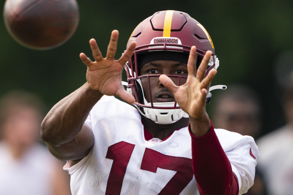 Washington Commanders wide receiver Terry McLaurin catches a pass after an NFL football practice at the team's training facility, Tuesday, Aug. 1, 2023, in Ashburn, Va. (AP Photo/Evan Vucci)