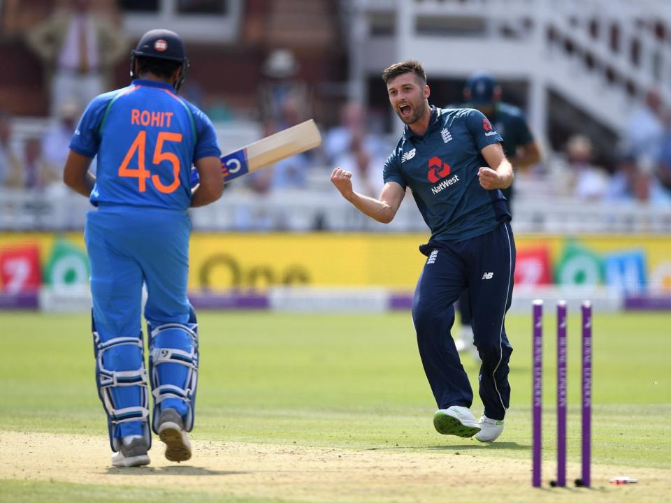 Mark Wood celebrates dismissing Rohit Sharma: Getty Images