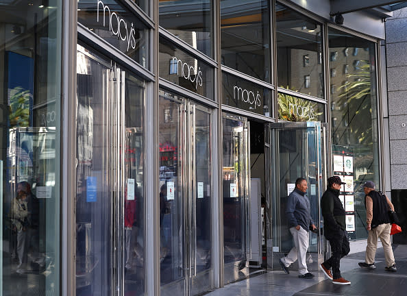 SAN FRANCISCO, CALIFORNIA - FEBRUARY 27: Customers leave a Macy's store that is set to close on February 27, 2024 in San Francisco, California. Macy's announced plans to shutter 150 underperforming stores across the United States, including their iconic flagship store in San Francisco's Union Square. (Photo by Justin Sullivan/Getty Images)