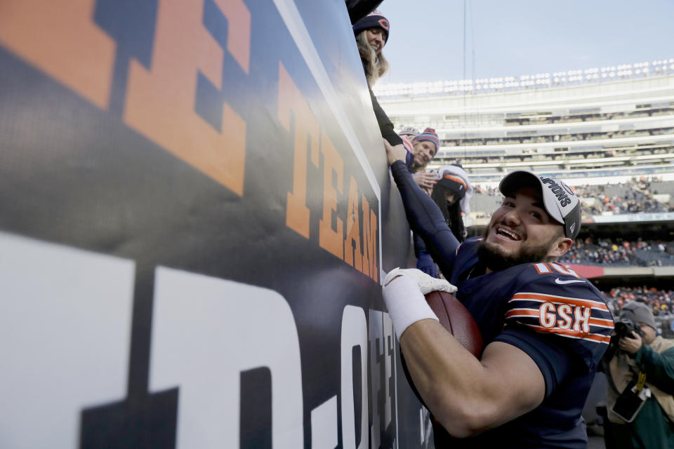 Everybody celebrate: Chicago Bears quarterback Mitchell Trubisky greets fans after the team’s playoff-clinching win on Sunday. (AP)