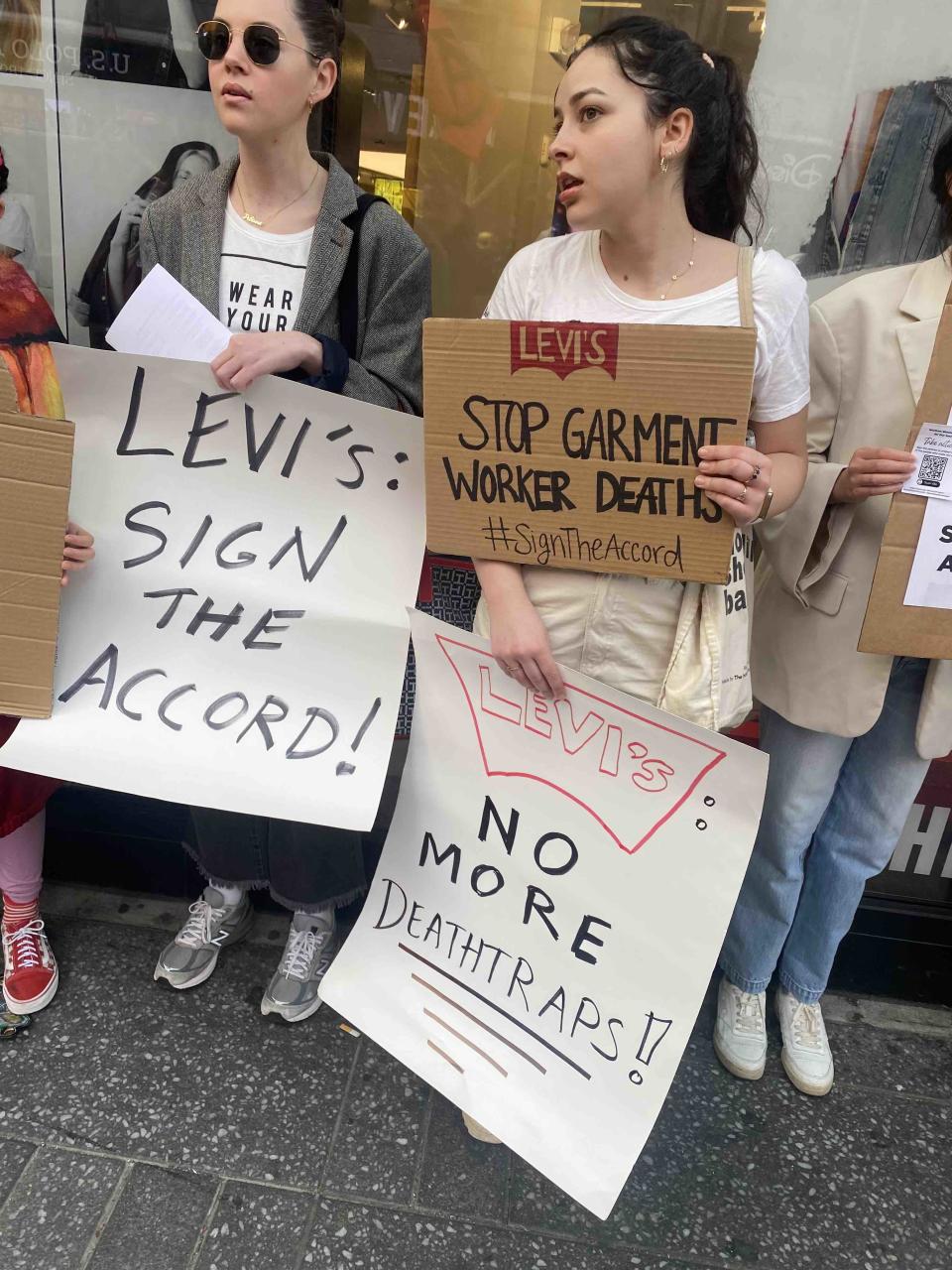 Protestors at Friday’s rally in front of Levi’s Times Square flagship store.