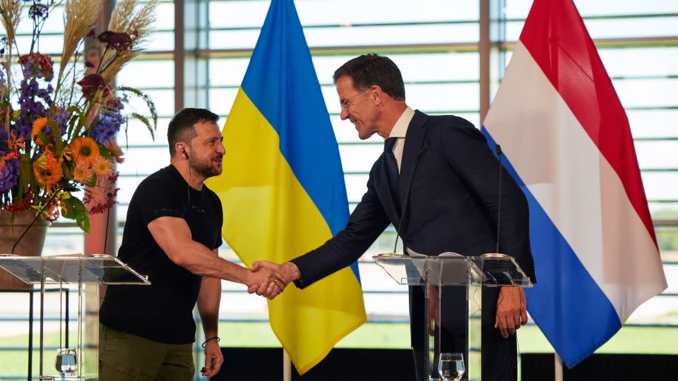 Volodymyr Zelenskiy shakes hands with Mark Rutte. - Ksenia Kuleshova/Bloomberg/Getty Images