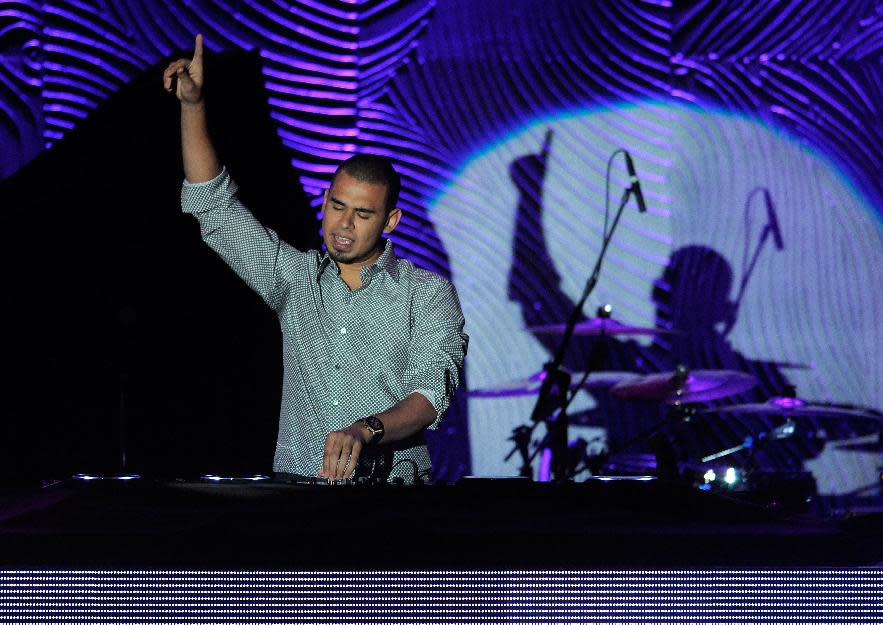 Afrojack performs at the Clive Davis Pre-GRAMMY Gala on Saturday, Feb. 9, 2013 in Beverly Hills, Calif. (Photo by Chris Pizzello/Invision/AP)