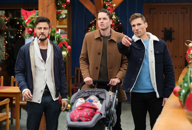 Bettina Strauss/Hallmark Media Tyler Hynes, Paul Campbell, and Andrew Walker in 2022's 'Three Wise Men and a Baby'