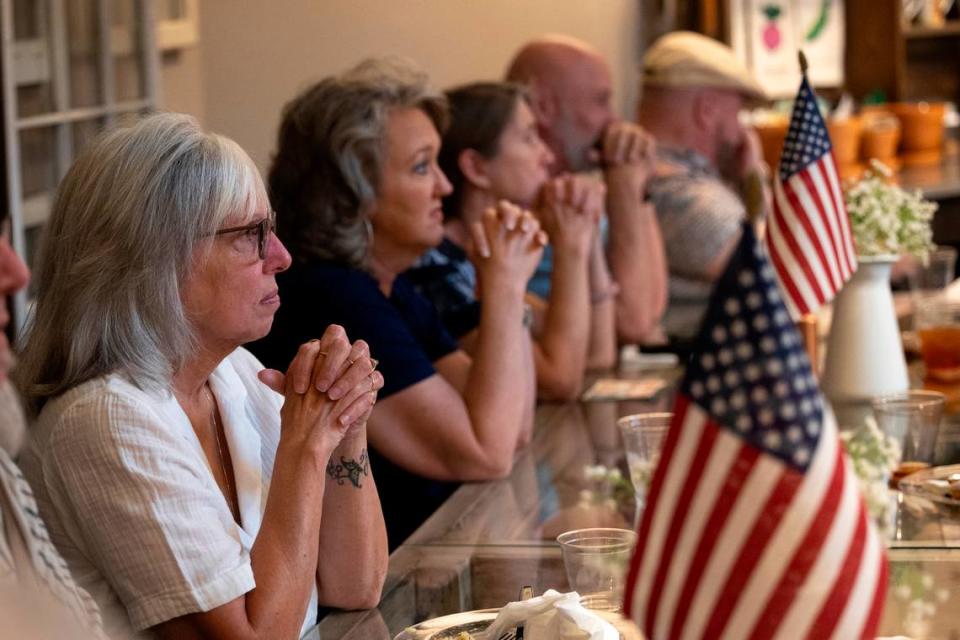 A group of about 100 people attend a Freedom Friday gathering at Momma Rabbit’s Nibbles and Sips on Friday, May 3, 2024.