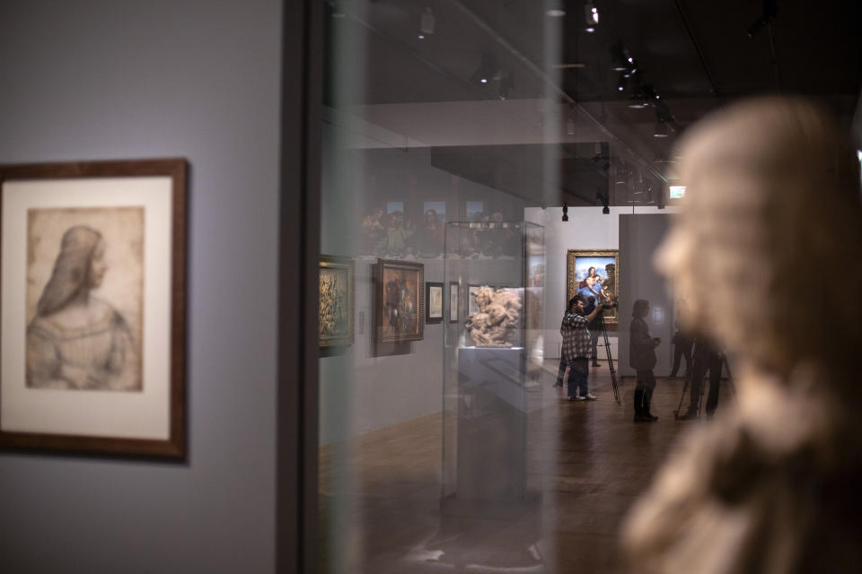 Artworks are displayed at the Leonardo da Vinci exhibition at the Louvre museum Sunday, Oct. 20, 2019 in Paris. A unique group of artworks is displayed at the Louvre museum in addition to its collection of paintings and drawings by the Italian master. The exhibition opens to the public on Oct.24, 2019. (AP Photo/Rafael Yaghobzadeh)