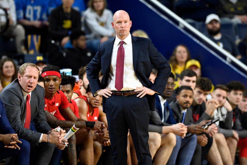Maryland head coach Kevin Willard, standing, watches his team play against Michigan in the first half of an NCAA college basketball game, Sunday, Jan. 1, 2023, in Ann Arbor, Mich. (AP Photo/Jose Juarez)