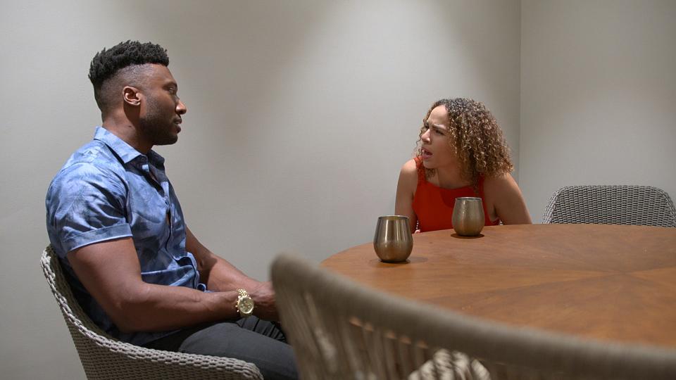 Uche Okoroha (left) and Lydia Velez Gonzalez argue about their relationship prior to going on "Love is Blind" in Season 5, Episode 7.