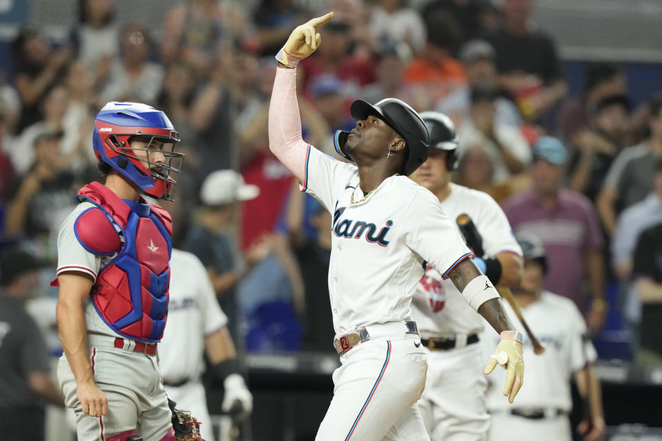 Miami Marlins' Jazz Chisholm Jr. (2) gestures after scoring on a solo home run during the sixth inning of a baseball game against the Philadelphia Phillies, Wednesday, Aug. 2, 2023, in Miami. (AP Photo/Marta Lavandier)