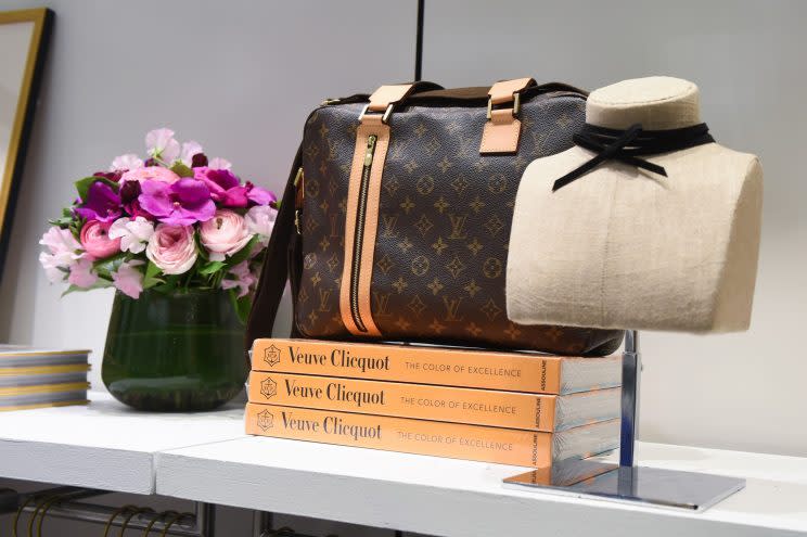 A close-up of a few of Olivia Palermo’s favorite picks, including a Louis Vuitton bag and Veuve Clicquot coffee-table books, in her pop-up shop at the Banana Republic Soho store in New York City. (Photo: Joe Schildhorn/BFAnyc.com)