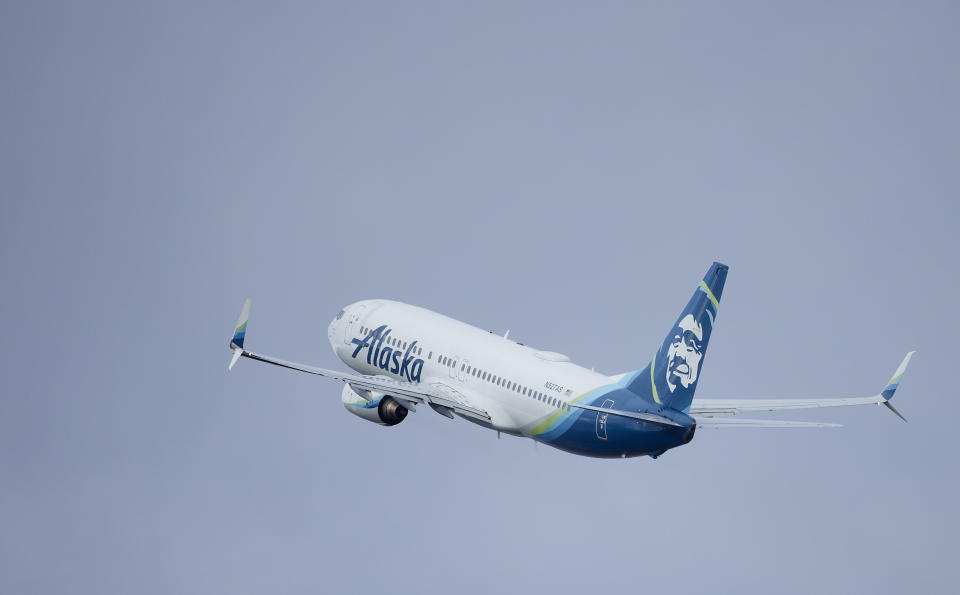 Alaska Airlines flight 794, a Boeing 737-800, takes off from Portland International Airport in Portland, Ore., Saturday, Jan. 6, 2024. The FAA has ordered the temporary grounding of Boeing 737 MAX 9 aircraft after part of the fuselage blew out during a flight. (AP Photo/Craig Mitchelldyer)