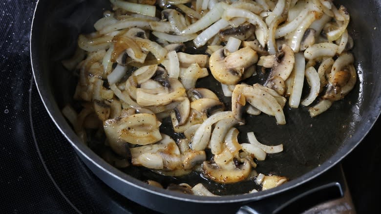 skillet of onions and mushrooms