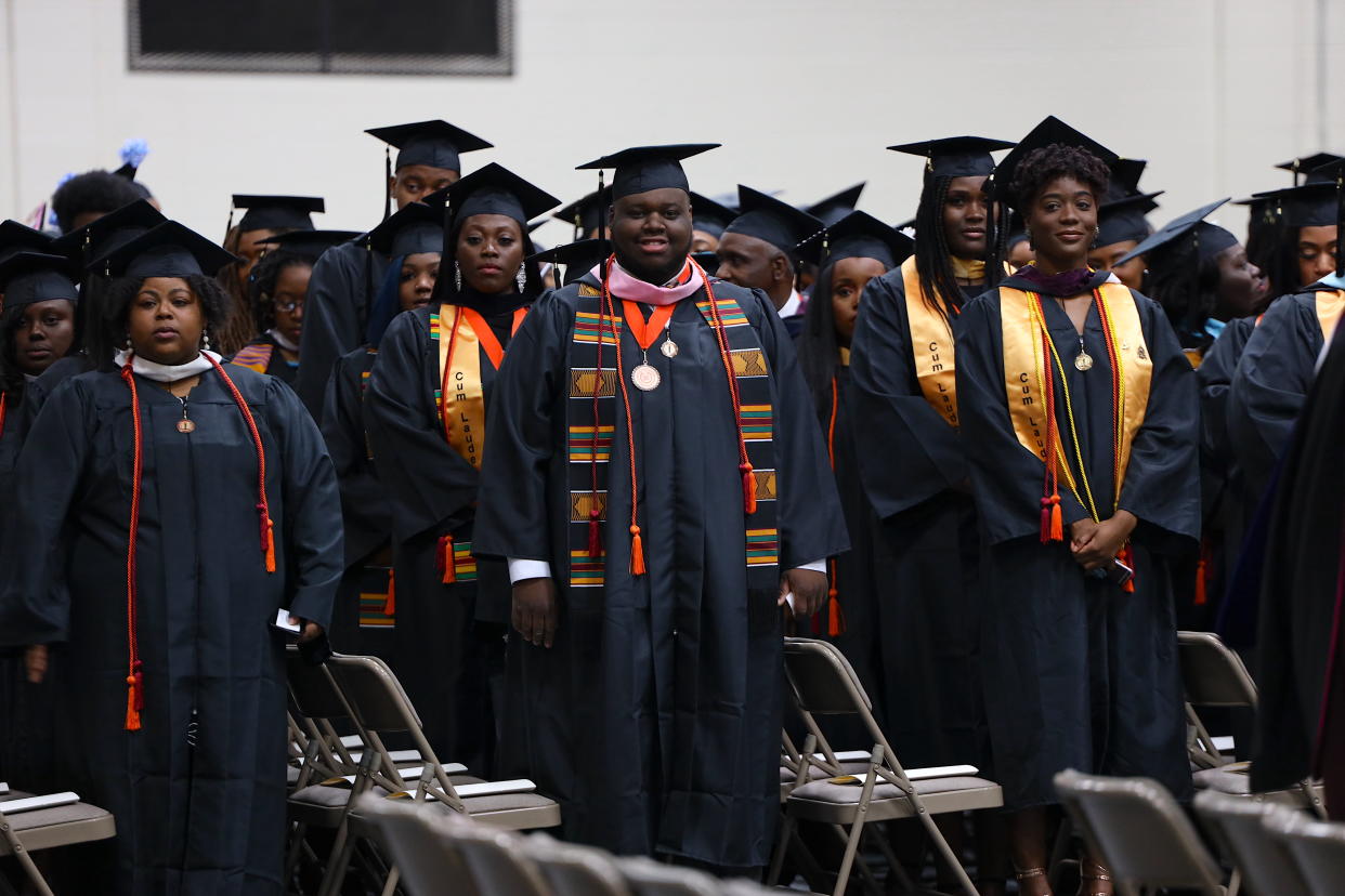 Faculty and staff in formal academic regalia pose at the Claflin University Fall 2019 Commencement.