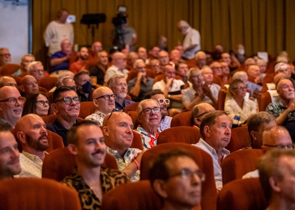 Audience members listen to a few speakers ahead of the premier of "Bros" during Cinema Diverse at the Palm Springs Cultural Center in Palm Springs, Calif., Thursday, Sept. 15, 2022.