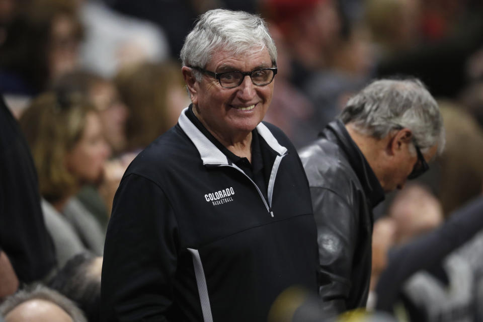 FILE - Retired Colorado head football coach Bill McCartney smiles duriung the second half of an NCAA college basketball game Saturday, March 9, 2019, in Boulder, Colo. By removing a potential stumbling block, Colorado has a chance to consistently win, just like in the days of Bill McCartney when the Buffaloes won their only national title. (AP Photo/David Zalubowski, File)