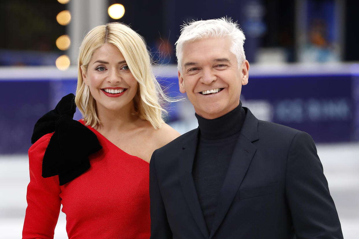 LONDON, ENGLAND - DECEMBER 18: Holly Willoughby and Phillip Schofield during a photocall for the new series of Dancing On Ice at the Natural History Museum Ice Rink on December 18, 2018 in London, England. (Photo by John Phillips/Getty Images)