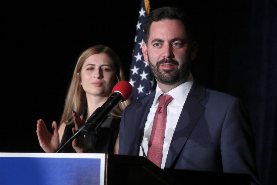 Mike Lawler, Republican candidate for the U.S. House of Representatives in the New York 17th district, with his wife Doina, speaks as election results come in at the Pearl River Hilton Nov. 8, 2022.