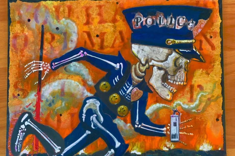 Diego Marcial Rios' painting "Will
Kill Blacks and Mexicans Cheap!" was removed with 19 other paintings from a public exhibit in San Mateo after complaints from police officers, he said. Photo courtesy of Diego Marcial Rios