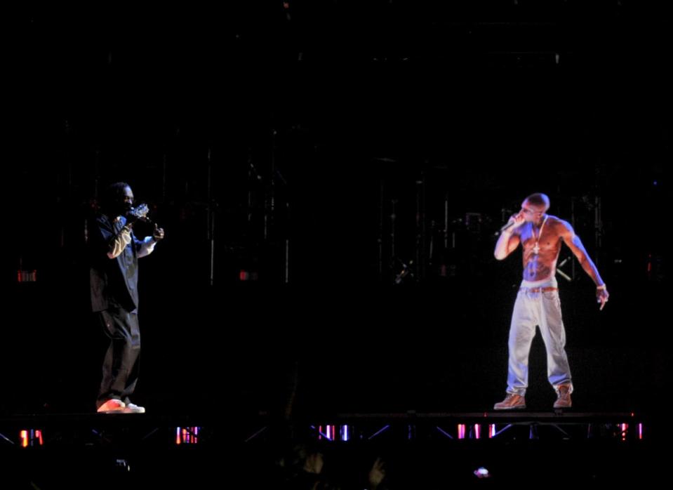 Snoop Dogg with the Tupac Shakur hologram in 2012 (Getty Images)