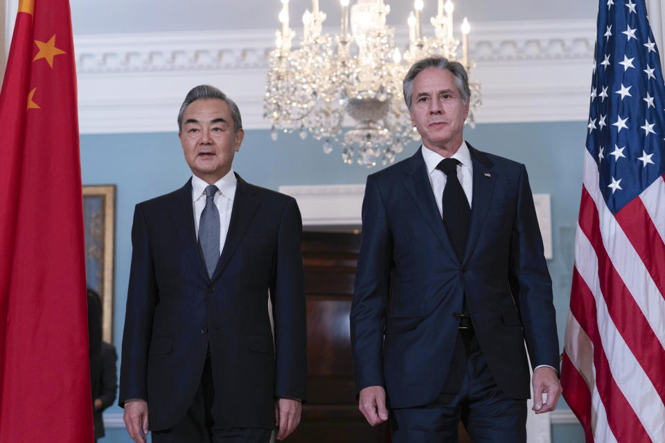 Secretary of State Antony Blinken accompanied by China's Foreign Minister Wang Yi walk to meet the media after a bilateral meeting at the State Department in Washington, Thursday, Oct. 26, 2023. (AP Photo/Jose Luis Magana)