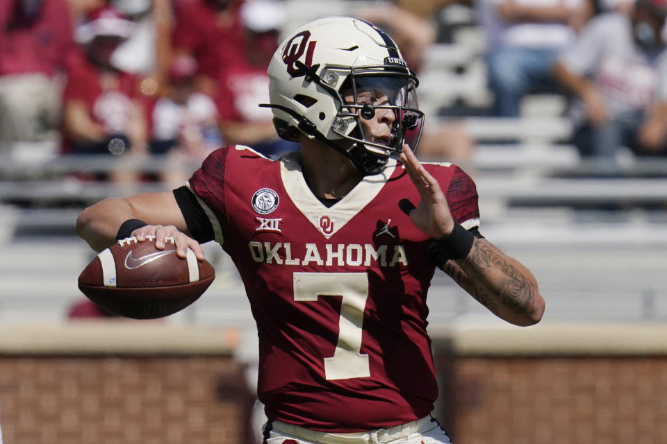 Oklahoma quarterback Spencer Rattler (7) passes in the second half of an NCAA college football game against Kansas State Saturday, Sept. 26, 2020, in Norman, Okla. (AP Photo/Sue Ogrocki).