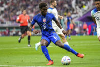 Yunus Musah of the United States controls the ball during the World Cup group B soccer match between England and The United States, at the Al Bayt Stadium in Al Khor , Qatar, Friday, Nov. 25, 2022. (AP Photo/Ashley Landis)