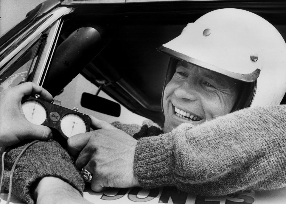 Parnelli Jones smiles after he won the pole for the Yankee 300 stock car race at Indianapolis Raceway Park in Brownsburg, Ind., in April 1963. Jones, the 1963 Indianapolis 500 winner, died Tuesday, June 4, 2024, at Torrance (Calif.) Memorial Medical Center after a battle with Parkinson's disease, his son said. Jones was 90.(AP Photo, File)