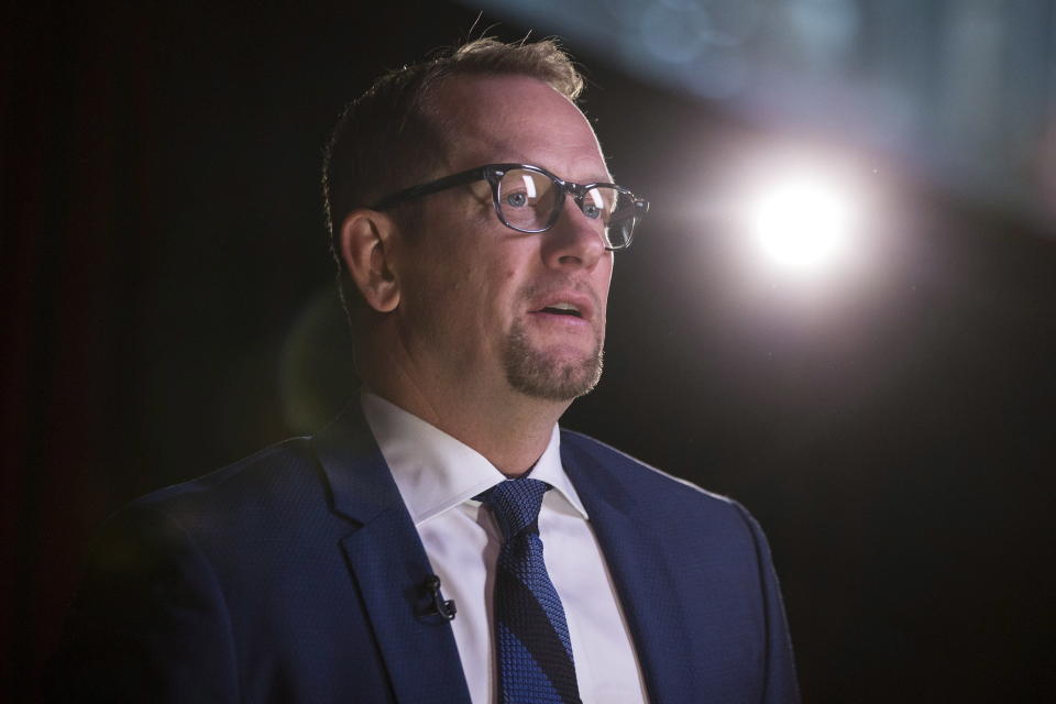 Toronto Raptors new head coach Nick Nurse sits for a television interview during the NBA basketball team's media day in Toronto, Monday, Sept. 24, 2018. (Chris Young/The Canadian Press via AP)