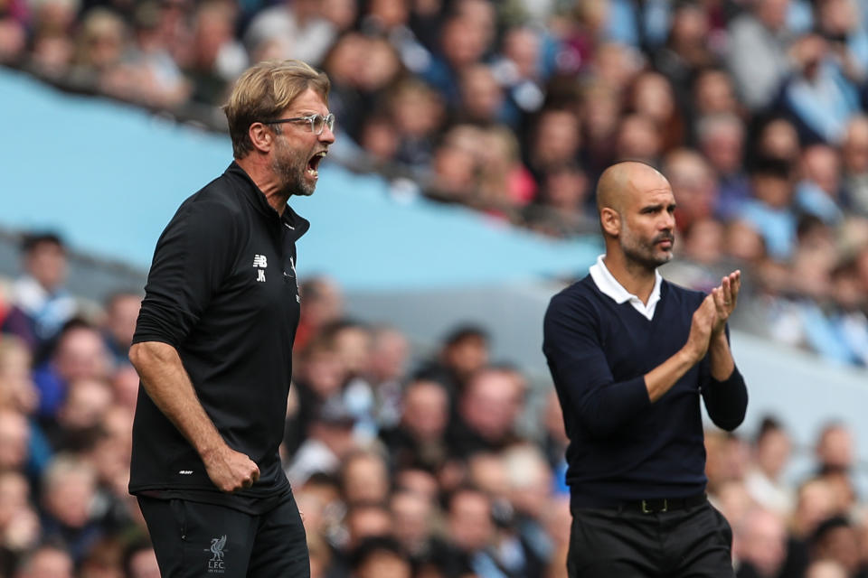 Jurgen Klopp, left, might not be too happy with Liverpool’s Round of 16 Champions League matchup vs. Bayern Munich. Pep Guardiola and Manchester City, meanwhile, fared much better in the draw. (Getty)