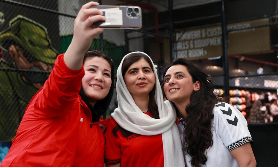Malala Yousafzai poses for a selfie with Fatima Yousufi, captain of Melbourne Victory AWT, and Khalida Popal, director of the Afghan women’s team