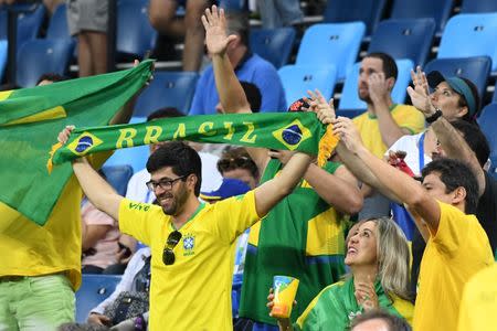 Aug 7, 2016; Rio de Janeiro, Brazil; Fans of Brazil cheer on their team before a men's preliminary round basketball game against Lithuania at Carioca Arena 1 during the 2016 Rio Summer Olympic Games. Mandatory Credit: Robert Hanashiro-USA TODAY Sports