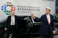 Kerry urges Taliban to follow Afghan warlord's peace deal