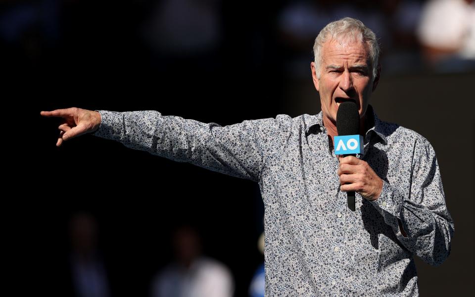 John McEnroe speaks on court after the Men's Singles third round match between Rafael Nadal of Spain and Pablo Carreno Busta of Spain - Getty Images