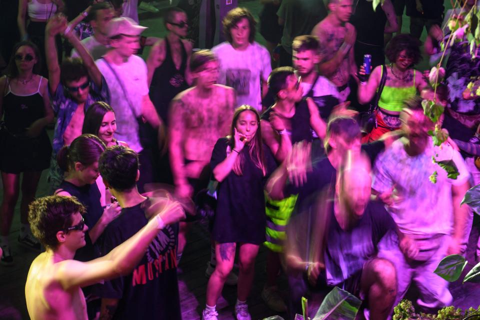 Revellers dance at a rave party in central Kyiv, Ukraine August 27, 2022.