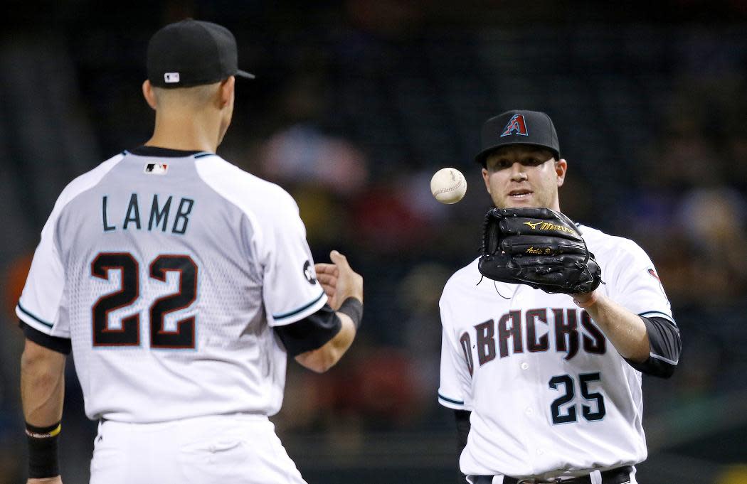 Arizona Diamondbacks teammates Jake Lamb (left) and Archie Bradley (right) are also best friends and roomates. (AP)