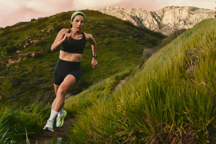 woman running in sports bra